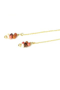 Necklace with colorful beads on a white background